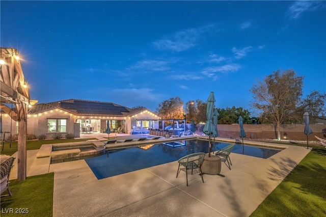 10319 Larkmead Ave, Las Vegas, NV 89149 - view of pool featuring a patio, a pool with connected hot tub, and a fenced backyard