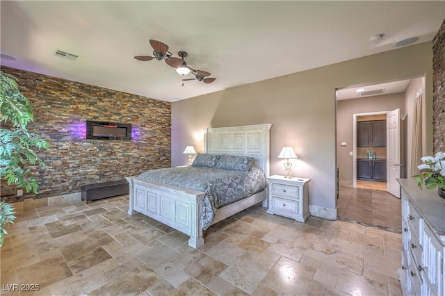 10319 Larkmead Ave, Las Vegas, NV 89149 - bedroom with stone tile flooring, baseboards, a ceiling fan, and a sink