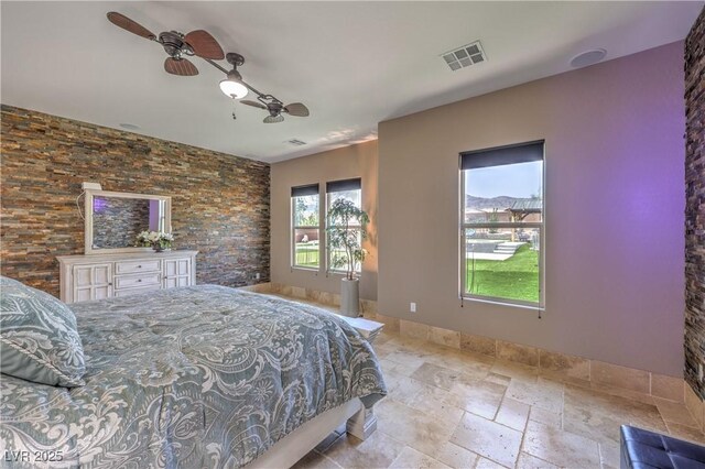 10319 Larkmead Ave, Las Vegas, NV 89149 - bedroom featuring stone tile floors and ceiling fan