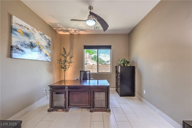 10319 Larkmead Ave, Las Vegas, NV 89149 - office area with a ceiling fan, light tile patterned flooring, and baseboards