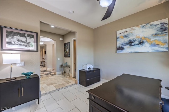 10319 Larkmead Ave, Las Vegas, NV 89149 - office featuring a ceiling fan, arched walkways, and baseboards