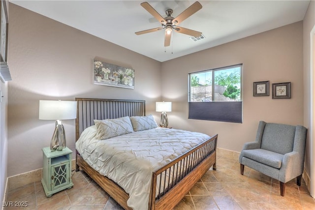 10319 Larkmead Ave, Las Vegas, NV 89149 - bedroom featuring baseboards, a ceiling fan, and light tile patterned floors