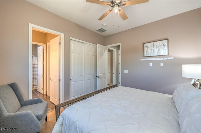 10319 Larkmead Ave, Las Vegas, NV 89149 - tiled bedroom with ceiling fan, a closet, and connected bathroom