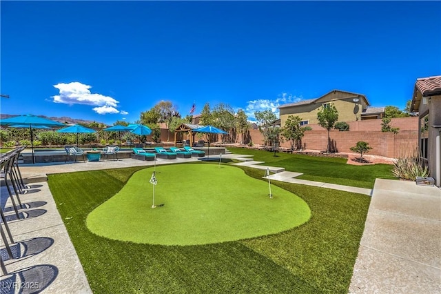 10319 Larkmead Ave, Las Vegas, NV 89149 - surrounding community featuring an area to practice putting, a patio area, and a pool