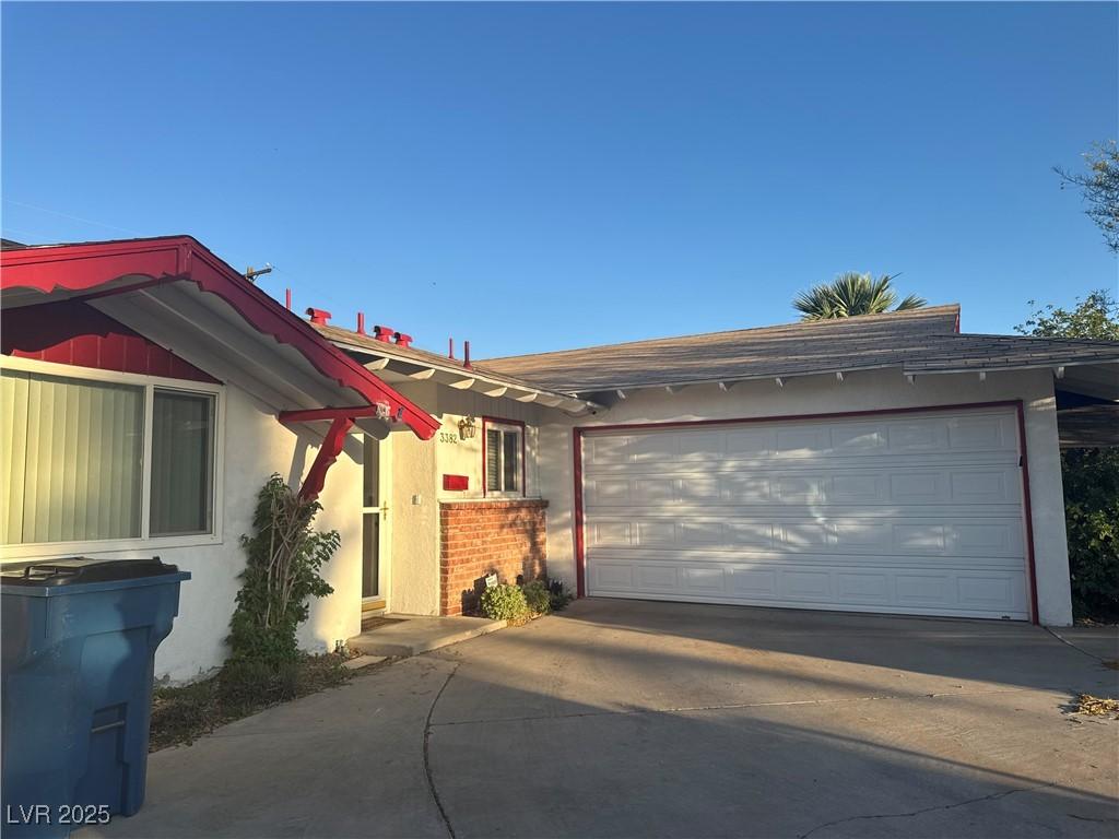 3382 Berwyck St, Las Vegas, NV 89121 - single story home featuring concrete driveway, stucco siding, and an attached garage