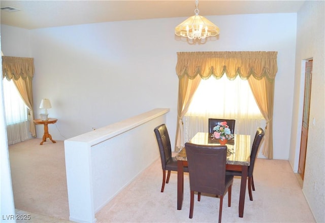 3519 W Red Coach Ave, North Las Vegas, NV 89031 - carpeted dining room featuring a chandelier