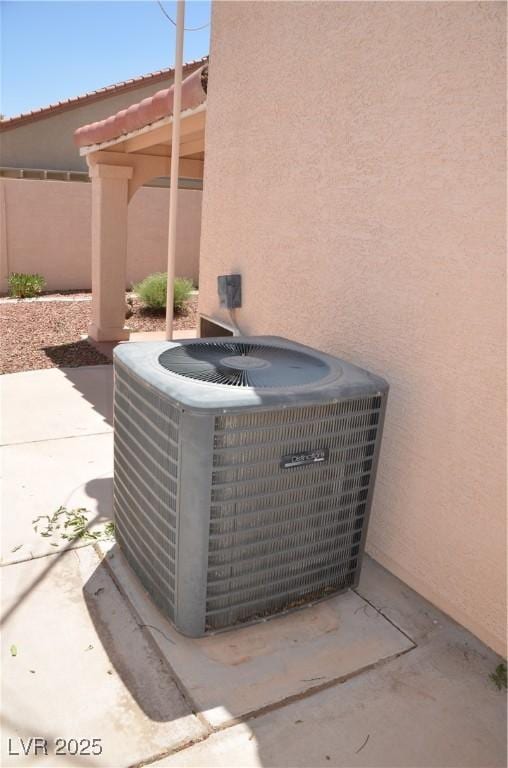 3519 W Red Coach Ave, North Las Vegas, NV 89031 - exterior view of central AC unit and stucco siding