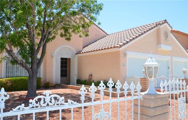 3519 W Red Coach Ave, North Las Vegas, NV 89031 - view of front of home with an attached garage, stucco siding, and a tiled roof