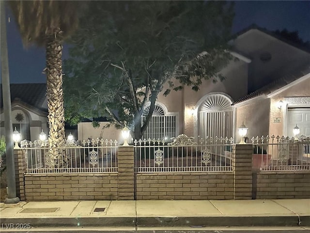 3519 W Red Coach Ave, North Las Vegas, NV 89031 - view of front of property featuring stucco siding