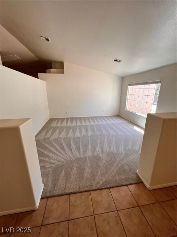 7255 W La Madre Way, Las Vegas, NV 89149 - tiled spare room with carpet floors and baseboards