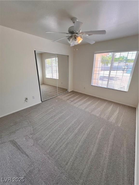 7255 W La Madre Way, Las Vegas, NV 89149 - empty room with carpet floors, a ceiling fan, and baseboards