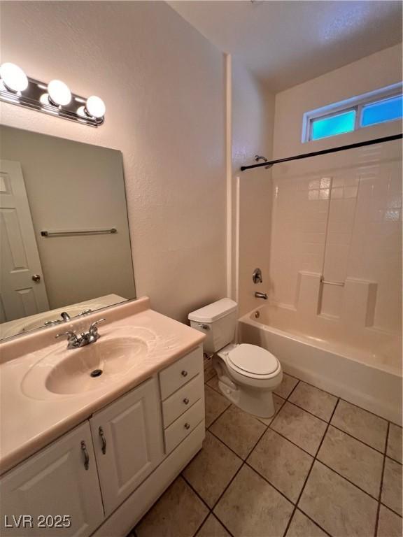 7255 W La Madre Way, Las Vegas, NV 89149 - full bath with tile patterned floors, toilet, vanity, and washtub / shower combination