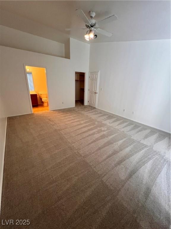 7255 W La Madre Way, Las Vegas, NV 89149 - spare room with light carpet, a ceiling fan, and baseboards