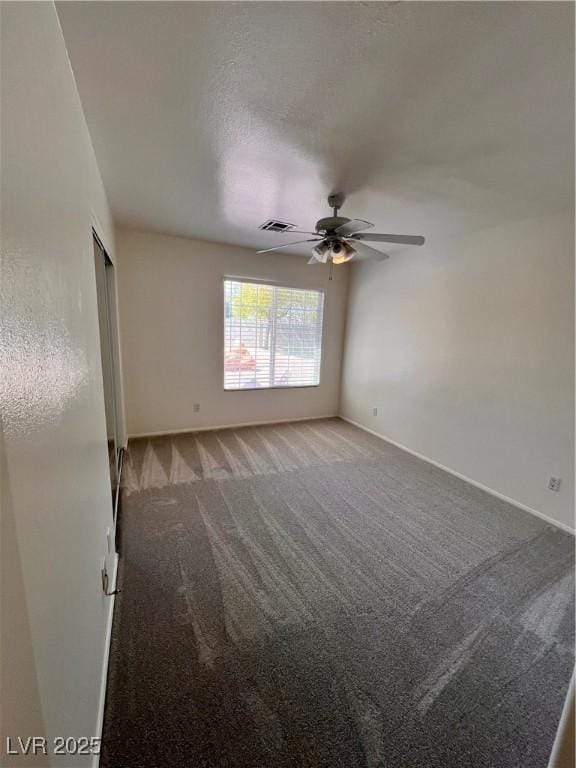 7255 W La Madre Way, Las Vegas, NV 89149 - empty room with light colored carpet, a ceiling fan, and baseboards