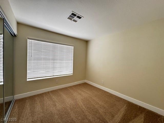 3005 Treasure Island Rd, Las Vegas, NV 89128 - spare room with carpet and baseboards