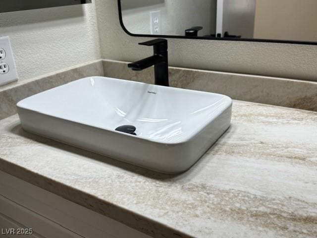3005 Treasure Island Rd, Las Vegas, NV 89128 - bathroom view of a sink and a textured wall