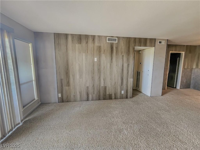 2867 Geary Pl Unit 3008, Las Vegas, NV 89109 - carpeted spare room with wooden walls