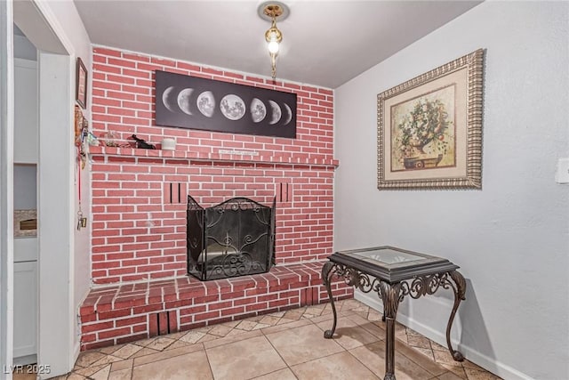 201 Cervantes St, Las Vegas, NV 89101 - living area with baseboards, tile patterned flooring, and a brick fireplace