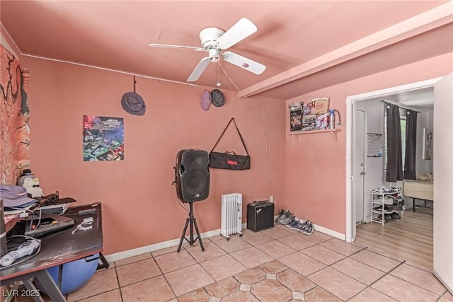 201 Cervantes St, Las Vegas, NV 89101 - interior space with a ceiling fan, radiator, tile patterned floors, and baseboards