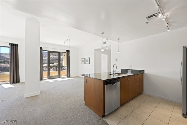 29 Montelago Blvd Unit 520, Henderson, NV 89011 - kitchen with appliances with stainless steel finishes, a sink, a peninsula, baseboards, and open floor plan