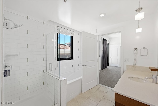 29 Montelago Blvd Unit 520, Henderson, NV 89011 - full bath featuring a shower stall, a garden tub, tile patterned floors, and vanity