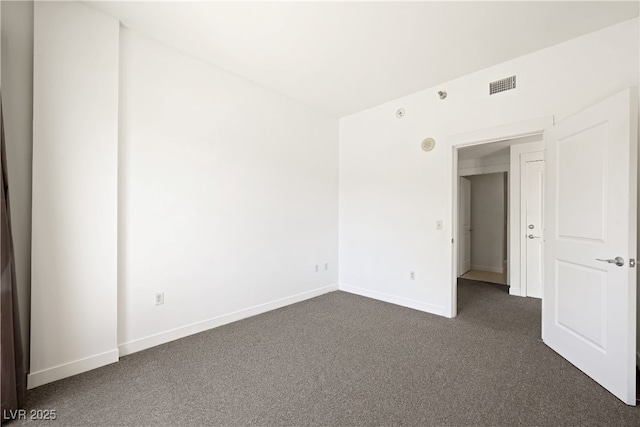 29 Montelago Blvd Unit 520, Henderson, NV 89011 - spare room featuring dark carpet and baseboards