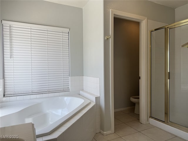 11029 Meadow Leaf Ave, Las Vegas, NV 89144 - bathroom with a shower stall, toilet, tile patterned floors, and a bath