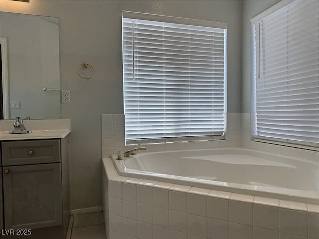 11029 Meadow Leaf Ave, Las Vegas, NV 89144 - bathroom featuring vanity, a garden tub, and healthy amount of natural light