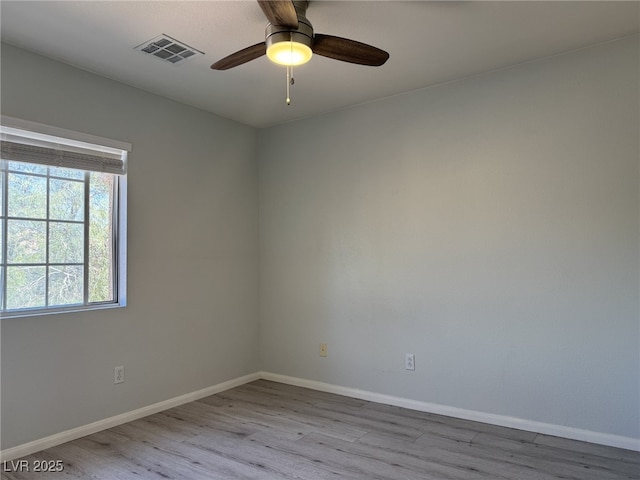 11029 Meadow Leaf Ave, Las Vegas, NV 89144 - spare room featuring wood finished floors, baseboards, and a ceiling fan