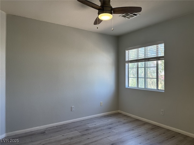 11029 Meadow Leaf Ave, Las Vegas, NV 89144 - spare room with wood finished floors, baseboards, and a ceiling fan