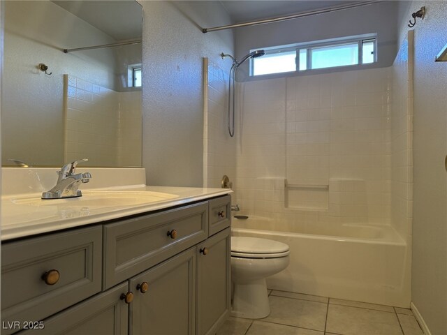 11029 Meadow Leaf Ave, Las Vegas, NV 89144 - bathroom featuring tile patterned floors, toilet, washtub / shower combination, and vanity