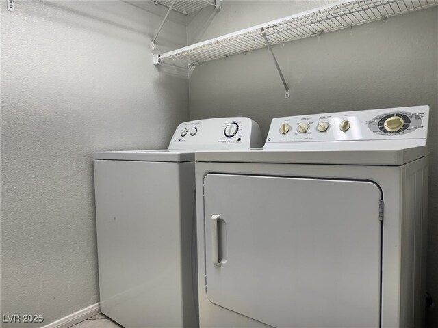 11029 Meadow Leaf Ave, Las Vegas, NV 89144 - laundry area featuring washer and clothes dryer and baseboards