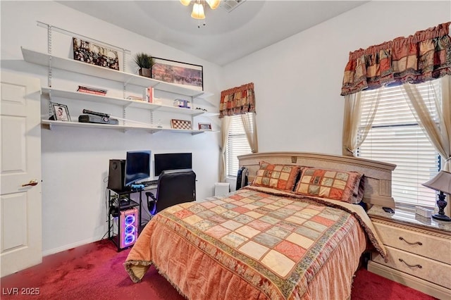 7461 Tahoe Basin Dr, Las Vegas, NV 89129 - bedroom with dark carpet, lofted ceiling, multiple windows, and ceiling fan