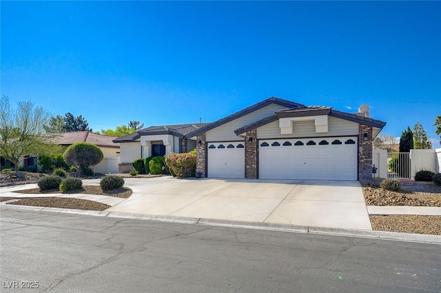 7461 Tahoe Basin Dr, Las Vegas, NV 89129 - ranch-style home featuring a garage, driveway, and a chimney