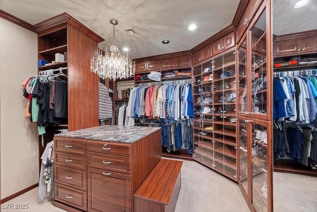3102 La Mirada Ave, Las Vegas, NV 89120 - walk in closet featuring a chandelier and light carpet