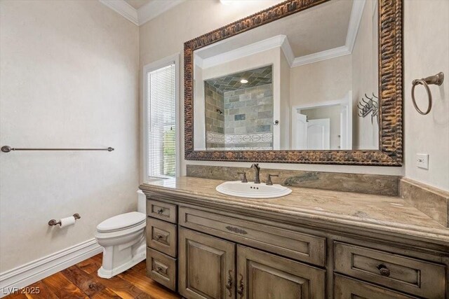 3102 La Mirada Ave, Las Vegas, NV 89120 - bathroom with ornamental molding, vanity, wood finished floors, and tiled shower