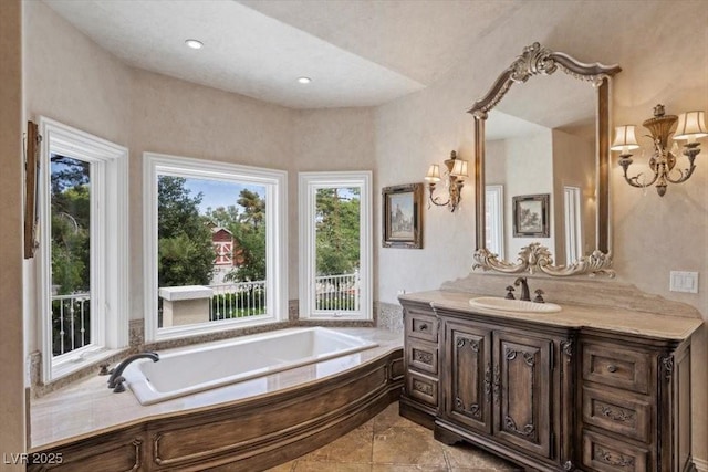 3102 La Mirada Ave, Las Vegas, NV 89120 - bathroom with vanity, a bath, and tile patterned floors