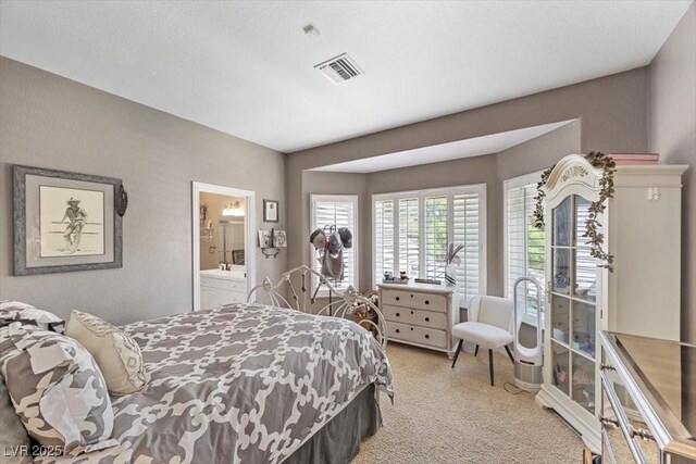 3102 La Mirada Ave, Las Vegas, NV 89120 - bedroom with light colored carpet and ensuite bath