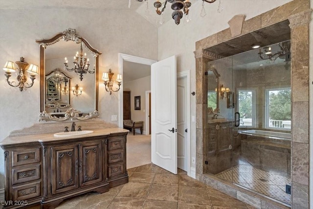 3102 La Mirada Ave, Las Vegas, NV 89120 - bathroom featuring a chandelier, vanity, a stall shower, and a towering ceiling