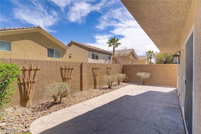 236 Dog Leg Dr, Las Vegas, NV 89148 - fenced backyard featuring a patio