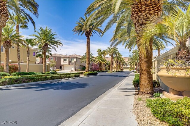 236 Dog Leg Dr, Las Vegas, NV 89148 - view of asphalt road with sidewalks, a residential view, and curbs