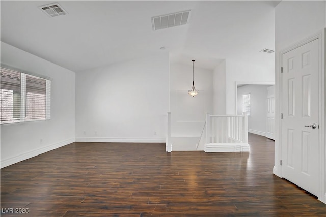 236 Dog Leg Dr, Las Vegas, NV 89148 - unfurnished room with dark wood finished floors, baseboards, and high vaulted ceiling
