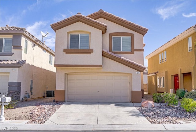236 Dog Leg Dr, Las Vegas, NV 89148 - view of front of property with stucco siding, central AC, concrete driveway, and an attached garage
