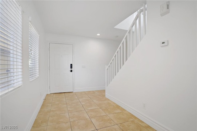 236 Dog Leg Dr, Las Vegas, NV 89148 - entrance foyer featuring stairway, light tile patterned flooring, baseboards, and recessed lighting