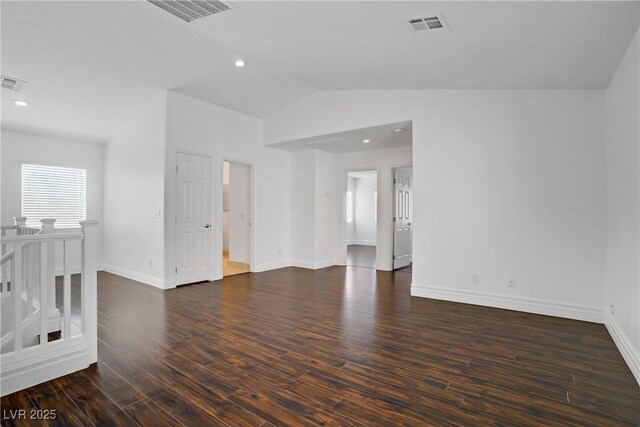 236 Dog Leg Dr, Las Vegas, NV 89148 - spare room with baseboards, wood finished floors, vaulted ceiling, and recessed lighting