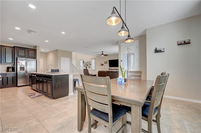 6334 Orions Belt Peak St, North Las Vegas, NV 89031 - dining space with light tile patterned flooring, ceiling fan, baseboards, and recessed lighting