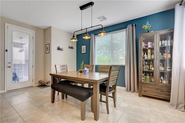 6334 Orions Belt Peak St, North Las Vegas, NV 89031 - dining space with light tile patterned flooring and baseboards