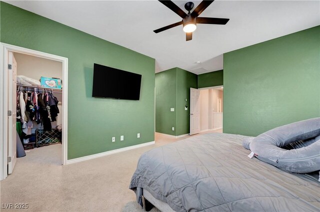 6334 Orions Belt Peak St, North Las Vegas, NV 89031 - carpeted bedroom featuring a spacious closet, baseboards, a closet, and ceiling fan