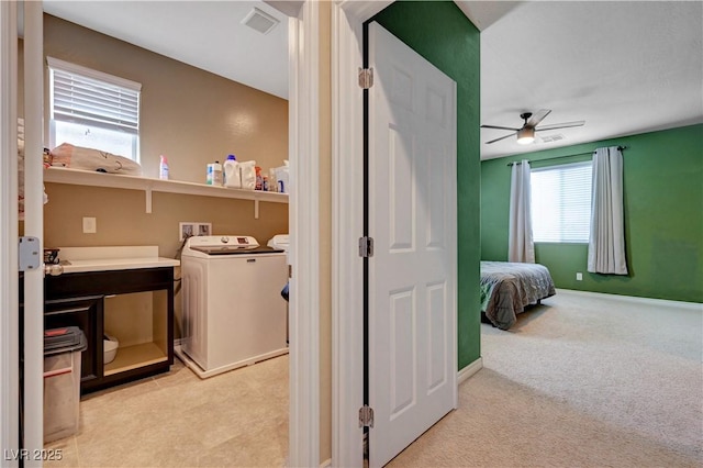 6334 Orions Belt Peak St, North Las Vegas, NV 89031 - bathroom featuring a ceiling fan, washer and clothes dryer, and baseboards