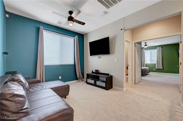 6334 Orions Belt Peak St, North Las Vegas, NV 89031 - living area with ceiling fan, carpet floors, and baseboards